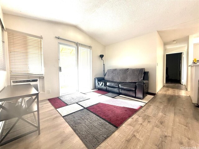 95-510 Wikao St Unit B201, Mililani, HI 96789 - living room with wood finished floors and vaulted ceiling
