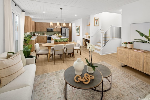 91-1101 Franklin D Roosevelt Ave Unit 353, Kapolei, HI 96707 - living area featuring light wood finished floors, stairway, recessed lighting, and wooden ceiling