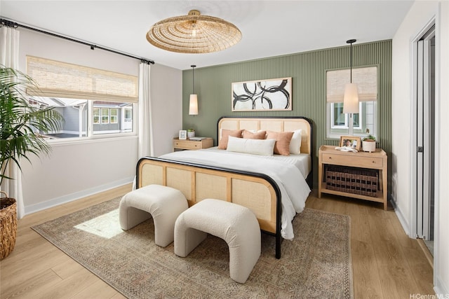 91-1101 Franklin D Roosevelt Ave Unit 353, Kapolei, HI 96707 - bedroom featuring wood finished floors and baseboards