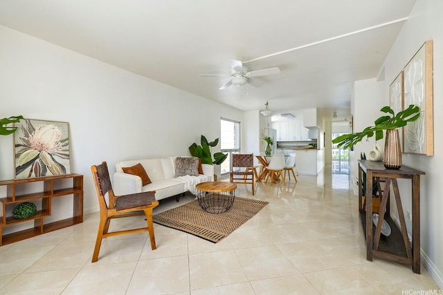 469 Ena Rd Unit 901, Honolulu, HI 96815 - living room with a ceiling fan, light tile patterned floors, and baseboards