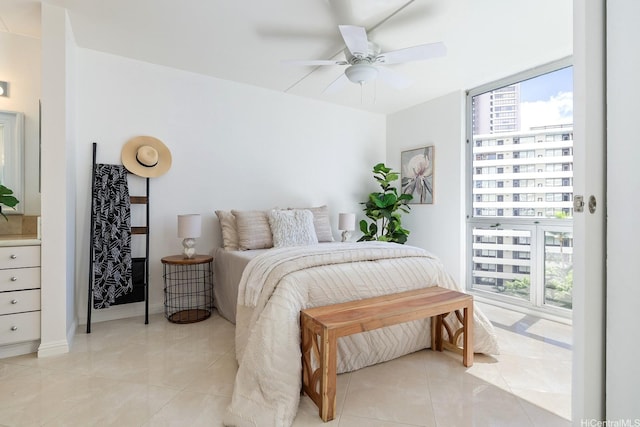 469 Ena Rd Unit 901, Honolulu, HI 96815 - bedroom with light tile patterned floors and a ceiling fan