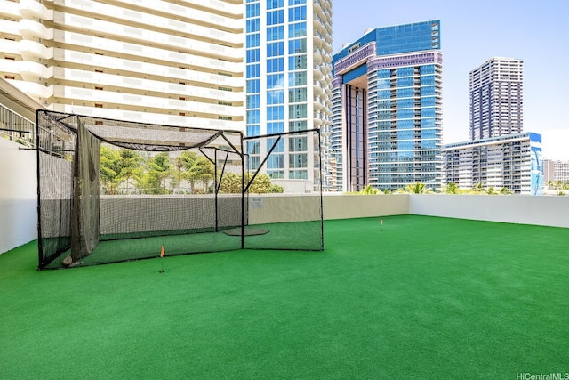 469 Ena Rd Unit 901, Honolulu, HI 96815 - view of home's community with a putting green and a city view