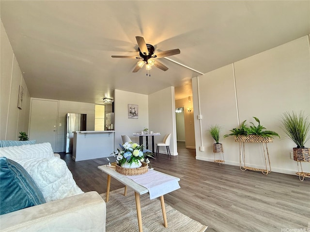 95-2055 Waikalani Pl Unit B204, Mililani, HI 96789 - living area with a ceiling fan, wood finished floors, and baseboards