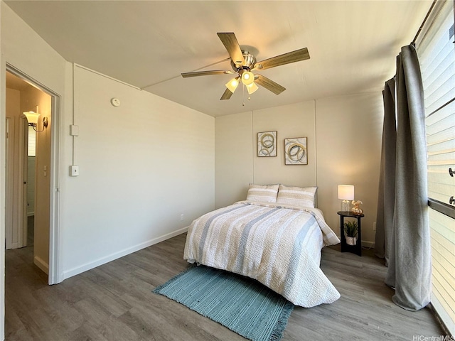 95-2055 Waikalani Pl Unit B204, Mililani, HI 96789 - bedroom with wood finished floors, ceiling fan, and baseboards
