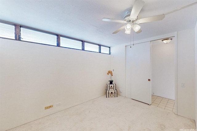 1630 Liholiho St Unit 1203, Honolulu, HI 96822 - basement featuring carpet flooring and ceiling fan