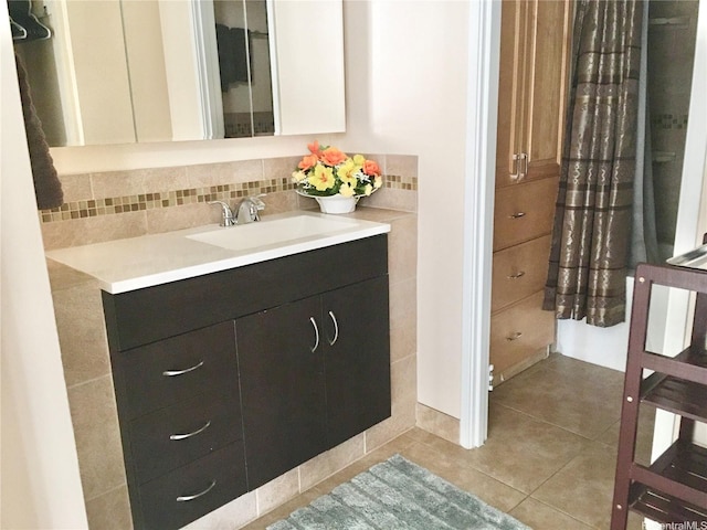 84-680 Kili Dr Unit 1204, Waianae, HI 96792 - bathroom featuring vanity, tile patterned flooring, and decorative backsplash