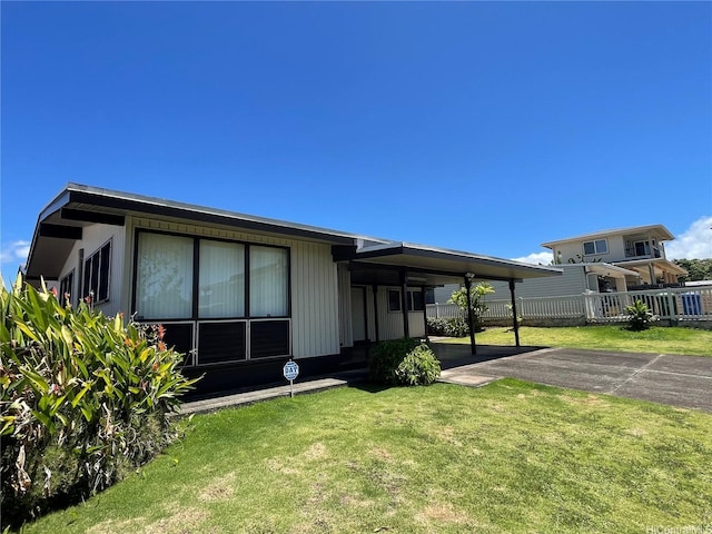 1676 Hoonipo St, Pearl City, HI 96782 - back of property with a carport