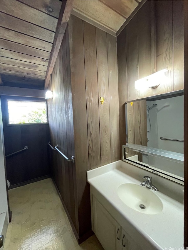 1676 Hoonipo St, Pearl City, HI 96782 - bathroom with vanity, wood walls, and tile patterned floors