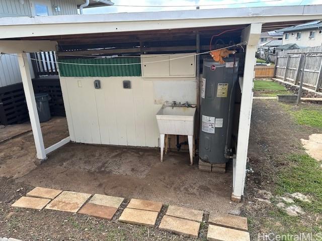 1846 Kilohi St, Honolulu, HI 96819 - view of patio featuring electric water heater and pet washing area