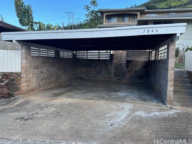 1846 Kilohi St, Honolulu, HI 96819 - view of vehicle parking featuring a carport and driveway