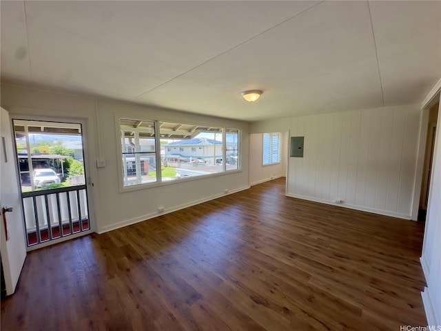 1846 Kilohi St, Honolulu, HI 96819 - unfurnished living room featuring dark wood-type flooring and electric panel