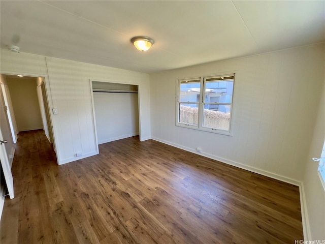 1846 Kilohi St, Honolulu, HI 96819 - unfurnished bedroom featuring wood finished floors and a closet