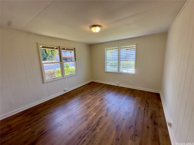 1846 Kilohi St, Honolulu, HI 96819 - empty room with dark wood-type flooring and baseboards