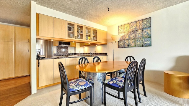 55 S Kukui St Unit D2701, Honolulu, HI 96813 - dining area featuring light colored carpet and a textured ceiling