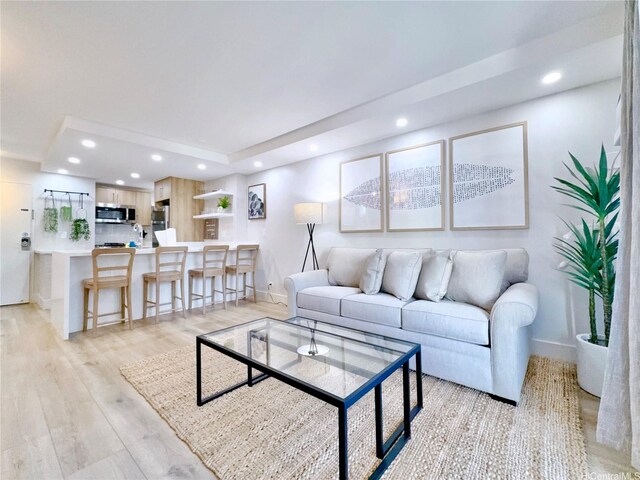 2465 Kuhio Ave Unit 1606, Honolulu, HI 96815 - living area with recessed lighting, baseboards, and light wood-type flooring