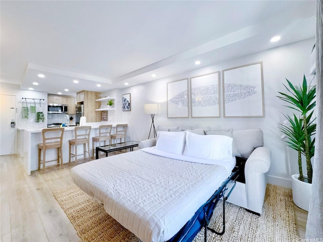 2465 Kuhio Ave Unit 1606, Honolulu, HI 96815 - bedroom with recessed lighting, light wood-style flooring, and baseboards
