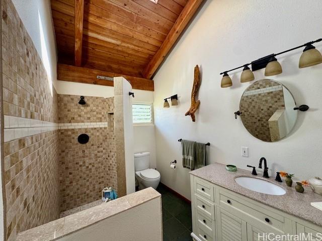 188 Ulua Rd, Kaunakakai, HI 96748 - bathroom with wood ceiling with exposed beams, vanity, toilet, and tiled shower