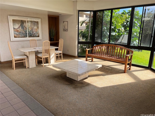 747 Wiliwili St Unit 1403, Honolulu, HI 96826 - carpeted living room featuring baseboards