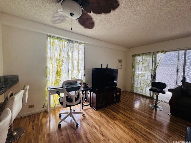 1615 Wilder Ave Unit 401, Honolulu, HI 96822 - office with wood finished floors, a textured ceiling, and ceiling fan