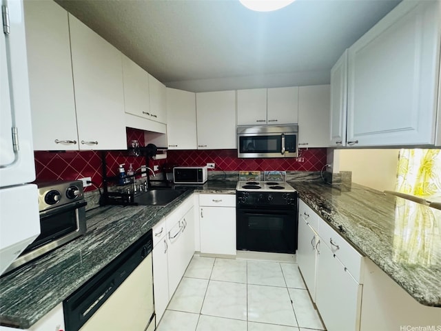 1615 Wilder Ave Unit 401, Honolulu, HI 96822 - kitchen featuring white appliances, a sink, tasteful backsplash, and white cabinets