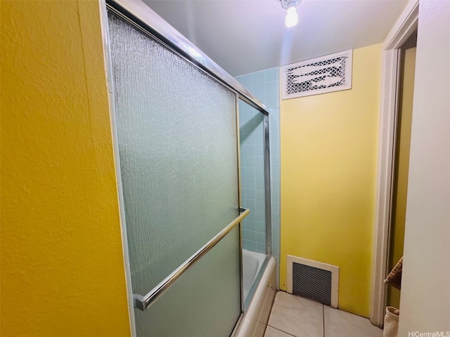 1615 Wilder Ave Unit 401, Honolulu, HI 96822 - full bathroom featuring tile patterned floors and combined bath / shower with glass door