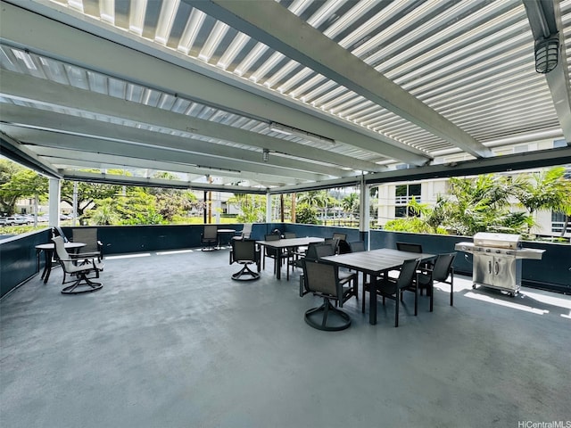 1615 Wilder Ave Unit 401, Honolulu, HI 96822 - view of patio featuring outdoor dining area and a grill