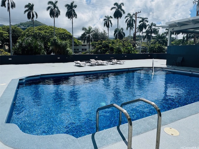 1615 Wilder Ave Unit 401, Honolulu, HI 96822 - community pool featuring a patio area