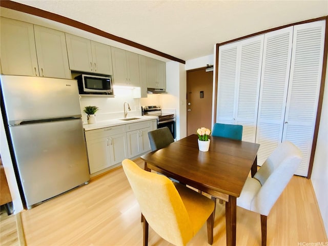 1655 Makaloa St Unit 911, Honolulu, HI 96814 - dining area featuring light wood finished floors