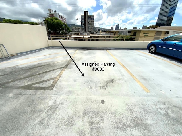 1655 Makaloa St Unit 911, Honolulu, HI 96814 - uncovered parking lot with a view of city