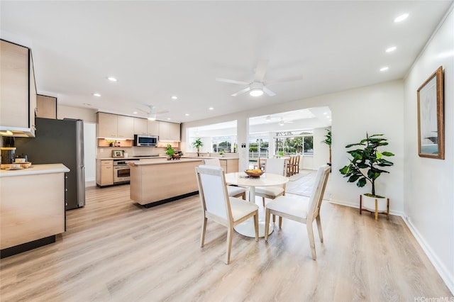 902 Wanaao Rd, Kailua, HI 96734 - dining area featuring ceiling fan, light wood-style flooring, recessed lighting, and baseboards