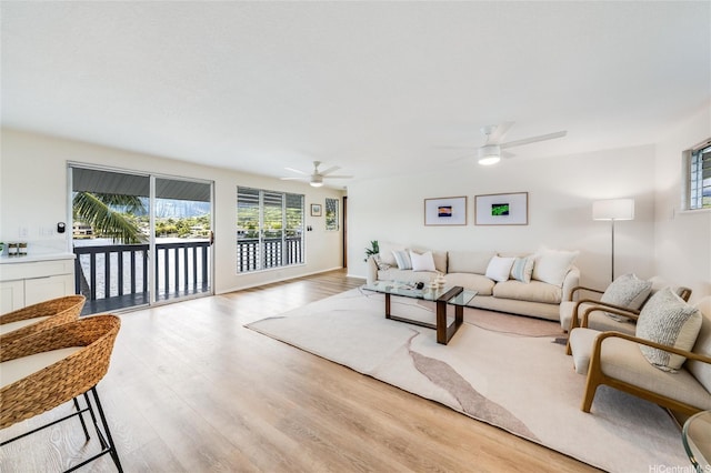 902 Wanaao Rd, Kailua, HI 96734 - living area with a ceiling fan and light wood-style floors