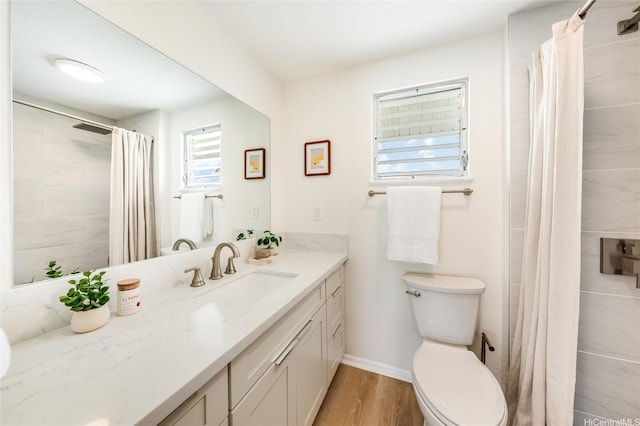 902 Wanaao Rd, Kailua, HI 96734 - bathroom with vanity, wood finished floors, toilet, and a shower with shower curtain