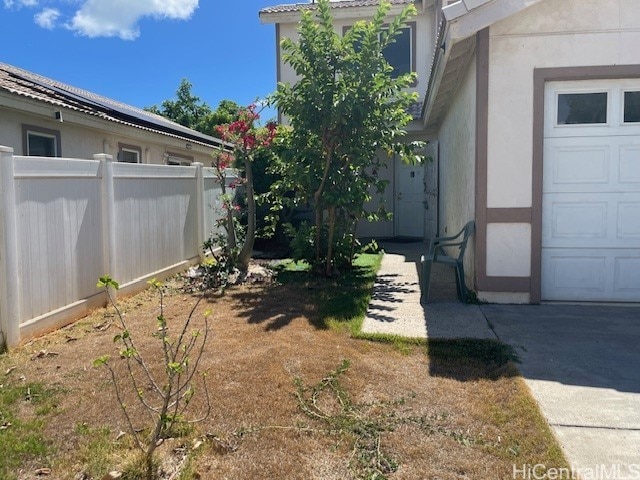 91-1501 Keonekapu St, Ewa Beach, HI 96706 - view of yard featuring a garage