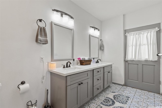 87-230 Holopono St, Waianae, HI 96792 - full bathroom featuring double vanity and tile patterned flooring