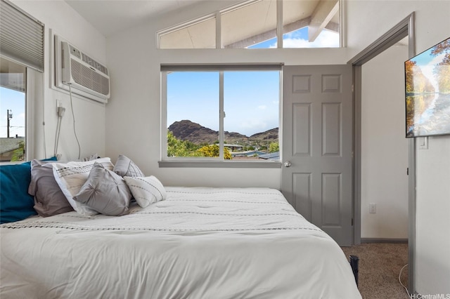 87-230 Holopono St, Waianae, HI 96792 - bedroom featuring carpet flooring, vaulted ceiling, an AC wall unit, and multiple windows