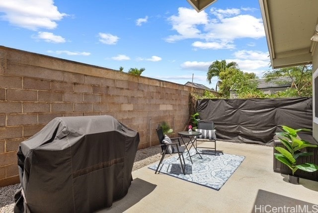 87-230 Holopono St, Waianae, HI 96792 - fenced backyard featuring area for grilling and a patio area