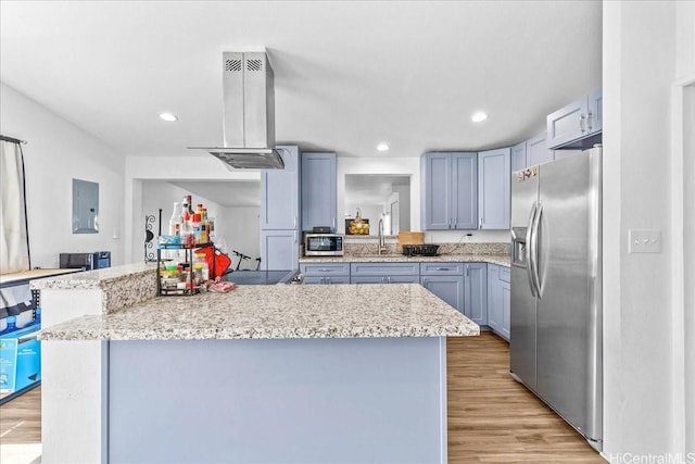 87-1698 Farrington Hwy Unit L, Waianae, HI 96792 - kitchen with appliances with stainless steel finishes, island range hood, electric panel, light wood finished floors, and recessed lighting