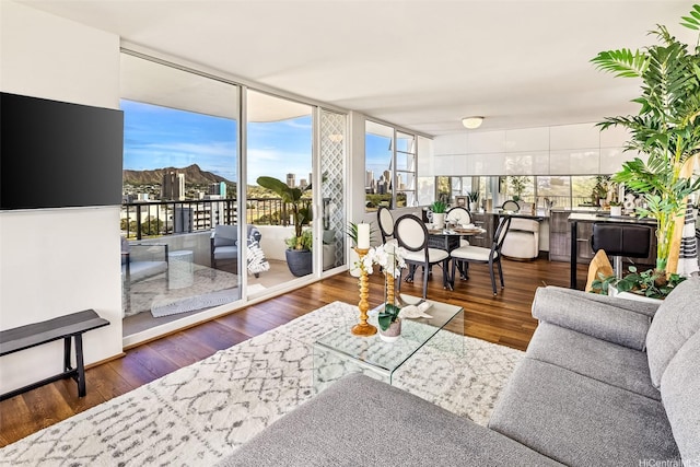 2825 S King St Unit 1403, Honolulu, HI 96826 - living area featuring healthy amount of natural light and wood finished floors