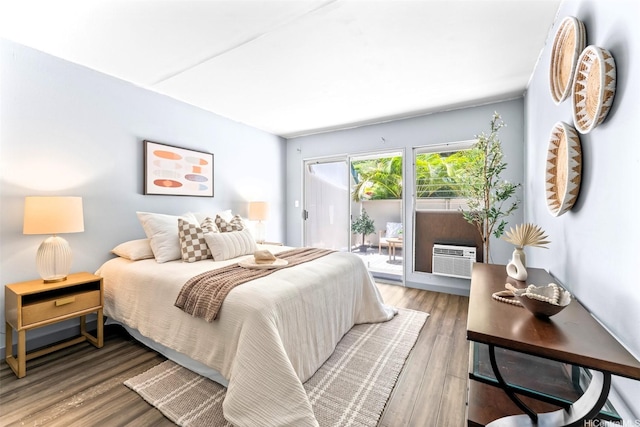 44-130 Mui Pl Unit 2605, Kaneohe, HI 96744 - bedroom featuring access to outside, wood finished floors, and a wall unit AC