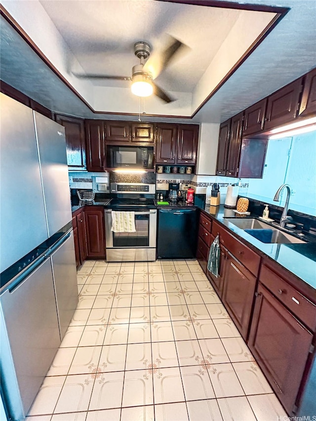 84-664 Ala Mahiku St Unit 196A, Waianae, HI 96792 - kitchen featuring black appliances, a sink, a raised ceiling, dark countertops, and a ceiling fan