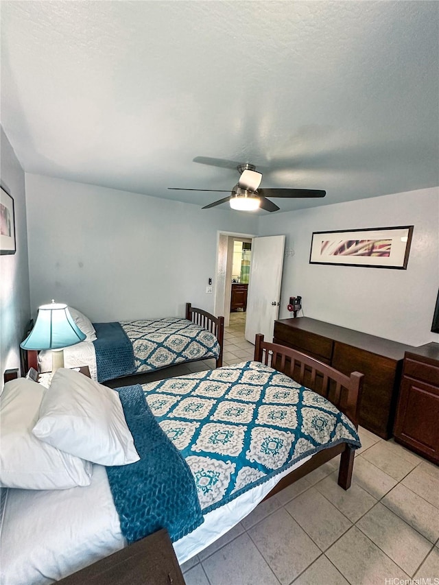 84-664 Ala Mahiku St Unit 196A, Waianae, HI 96792 - bedroom with light tile patterned floors and a ceiling fan