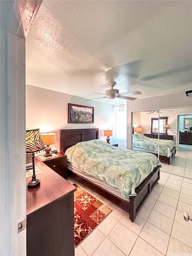 84-664 Ala Mahiku St Unit 196A, Waianae, HI 96792 - bedroom featuring a textured ceiling, light tile patterned floors, and ceiling fan