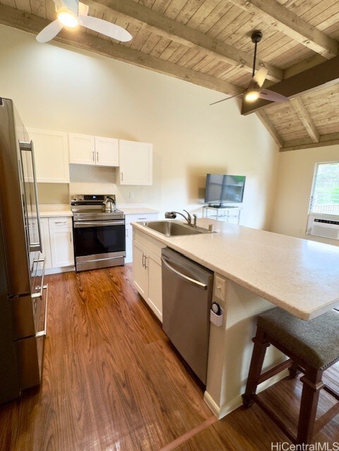 47-665 Hui Kelu St Unit 7702, Kaneohe, HI 96744 - kitchen featuring stainless steel appliances, a ceiling fan, wooden ceiling, a sink, and white cabinets