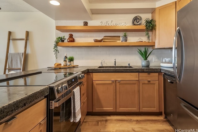3138 Waialae Ave Unit 230, Honolulu, HI 96816 - kitchen featuring appliances with stainless steel finishes, a sink, open shelves, light wood-style flooring, and decorative backsplash