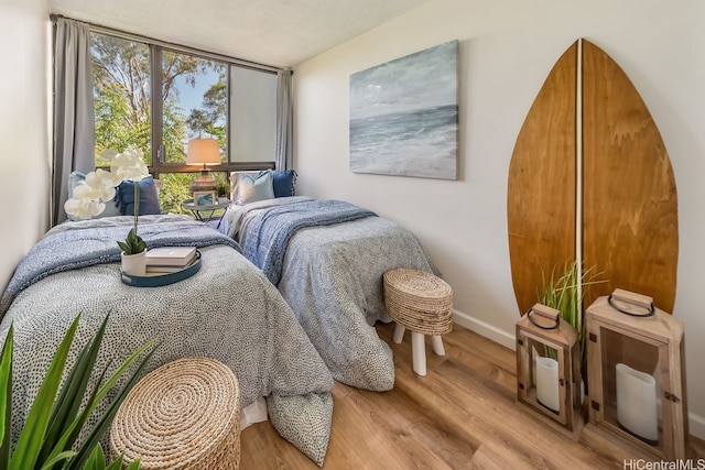 3138 Waialae Ave Unit 230, Honolulu, HI 96816 - bedroom with wood finished floors and baseboards