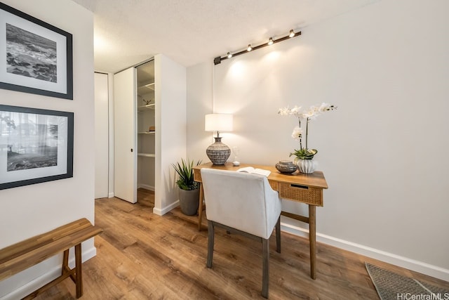 3138 Waialae Ave Unit 230, Honolulu, HI 96816 - home office featuring wood finished floors and baseboards