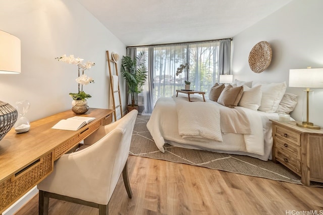 3138 Waialae Ave Unit 230, Honolulu, HI 96816 - bedroom featuring wood finished floors and floor to ceiling windows