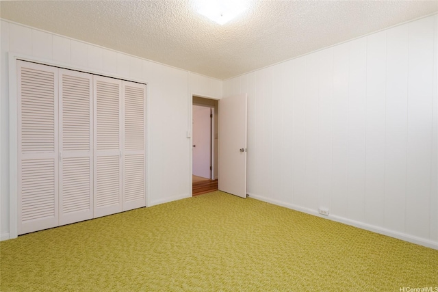 1157 Ala Aloalo St, Honolulu, HI 96818 - unfurnished bedroom with light carpet, a closet, and a textured ceiling
