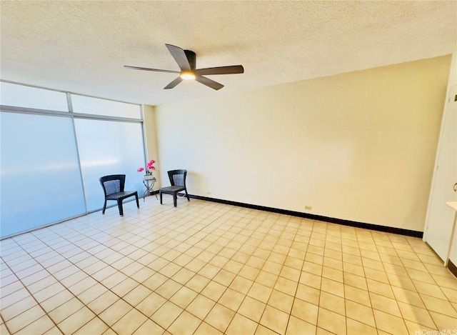 1323 Makiki St Unit A304, Honolulu, HI 96814 - spare room featuring a ceiling fan and a textured ceiling