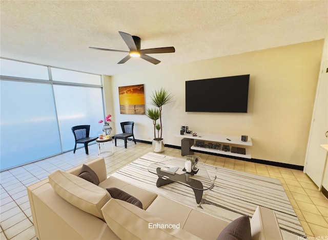 1323 Makiki St Unit A304, Honolulu, HI 96814 - living area with ceiling fan, light tile patterned floors, and a textured ceiling